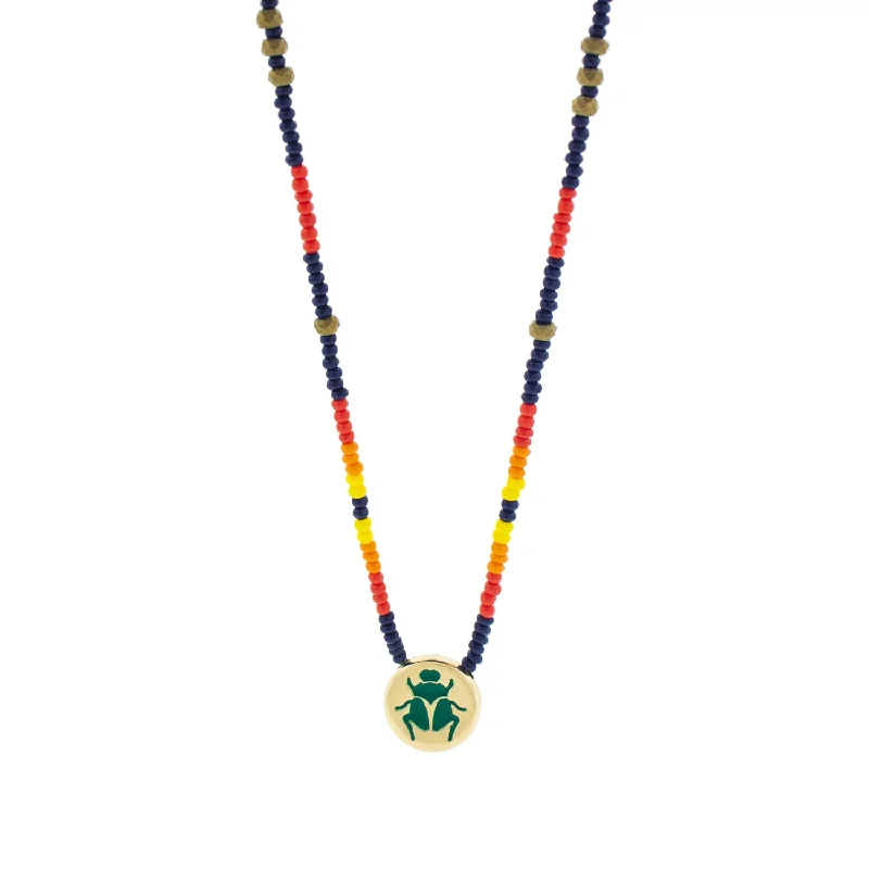 Designer Necklaces-Enameled Gold Scarab Disk on Glass Beaded Necklace